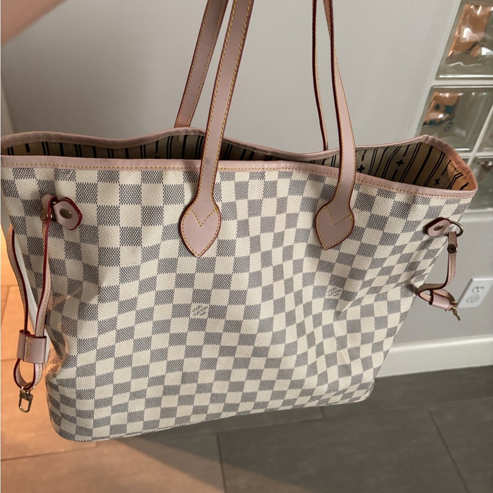 New Monogram shoulder bag.
